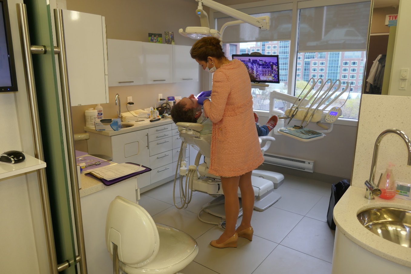 Rob in dentist's chair with natalie archer dentist Toronto