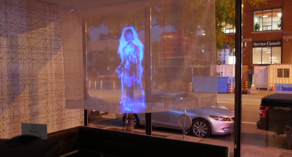 Friday ghost projector on sheers in store front window was incomplete 