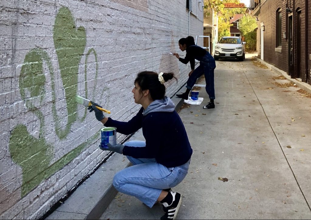 Mural painters, graffiti artists at work in Toronto, 