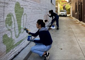 Mural painters, graffiti artists at work in Toronto,